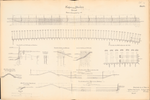 Ein aufgeschlagenes Buch mit einer detaillierten Zeichnung einer Eisenbahnstrecke neben Text, das einen Überblick über das Eisenbahnsystem bietet.