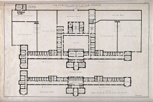 Schwarz-weißer Architekturplan eines Gebäudes mit zahlreichen beschrifteten Räumen, darunter ein 'Irrenhaus für Verbrecher'.
