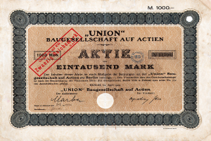 Ein alter deutscher Bankschein mit einem roten Stempel und Text, der darauf hinweist, dass es ein Aktienzertifikat ist.